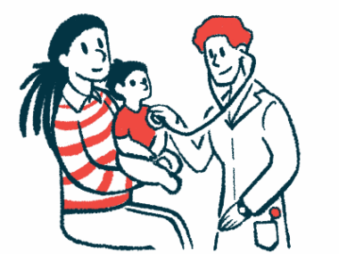 A doctor presses his stethoscope to the chest of a small child sitting on their mother's lap.